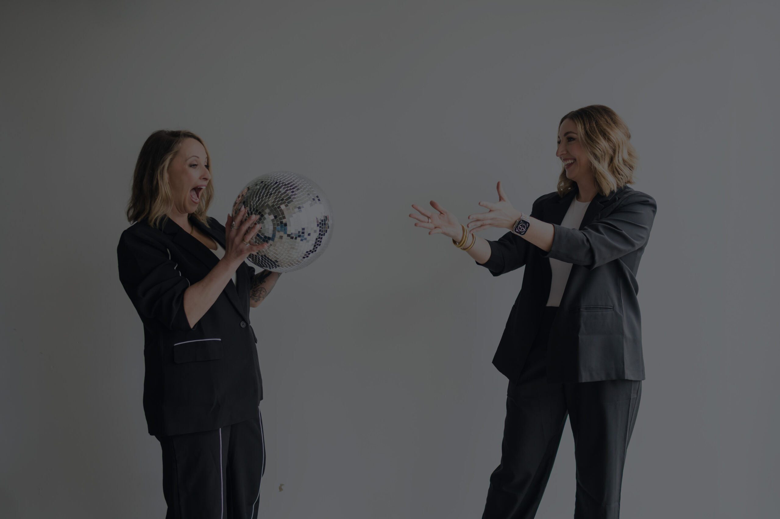 Founders Holding Disco Ball